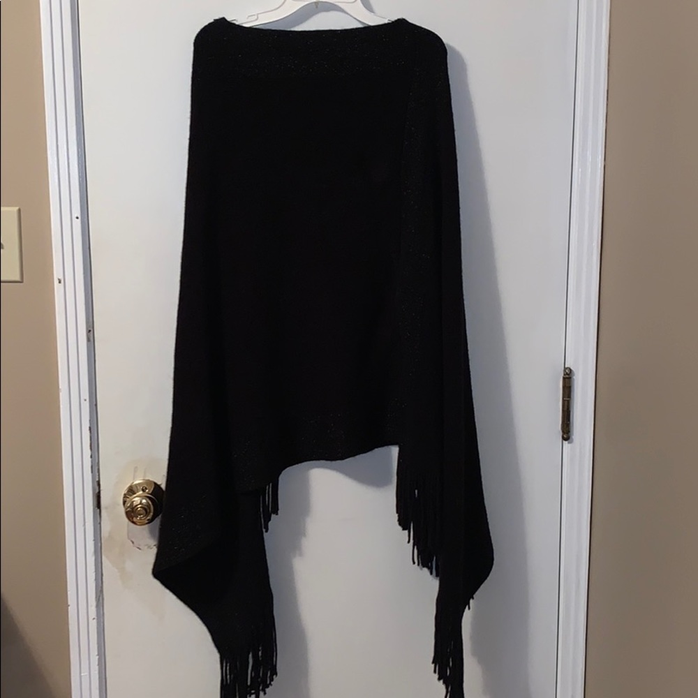 100% acrylic black woven poncho